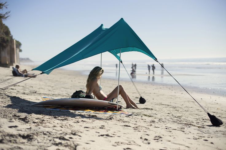 Otentik SunShade: Beach Tent the Size of a Rolled-up Towel - GetdatGadget